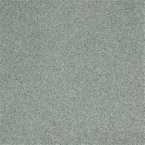 A close-up of Harbor Town Family Friendly Carpet in Links shows its light gray, textured, stain-resistant surface with dense fibers—ideal for a family-friendly home.