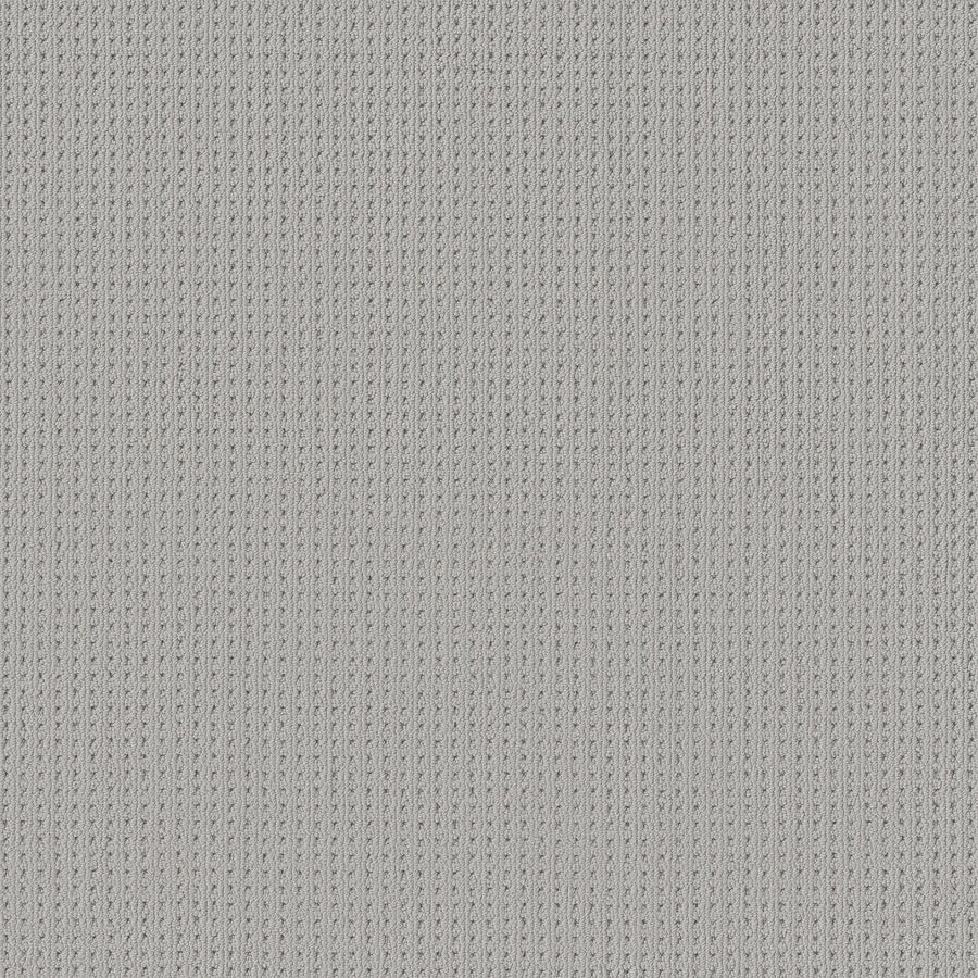 Close-up of San Lucas Family Friendly Carpet in Lullaby, showing gray knitted fabric with vertical ribbed texture—fine stitches and a stylish, durable surface ideal for high-traffic family homes.