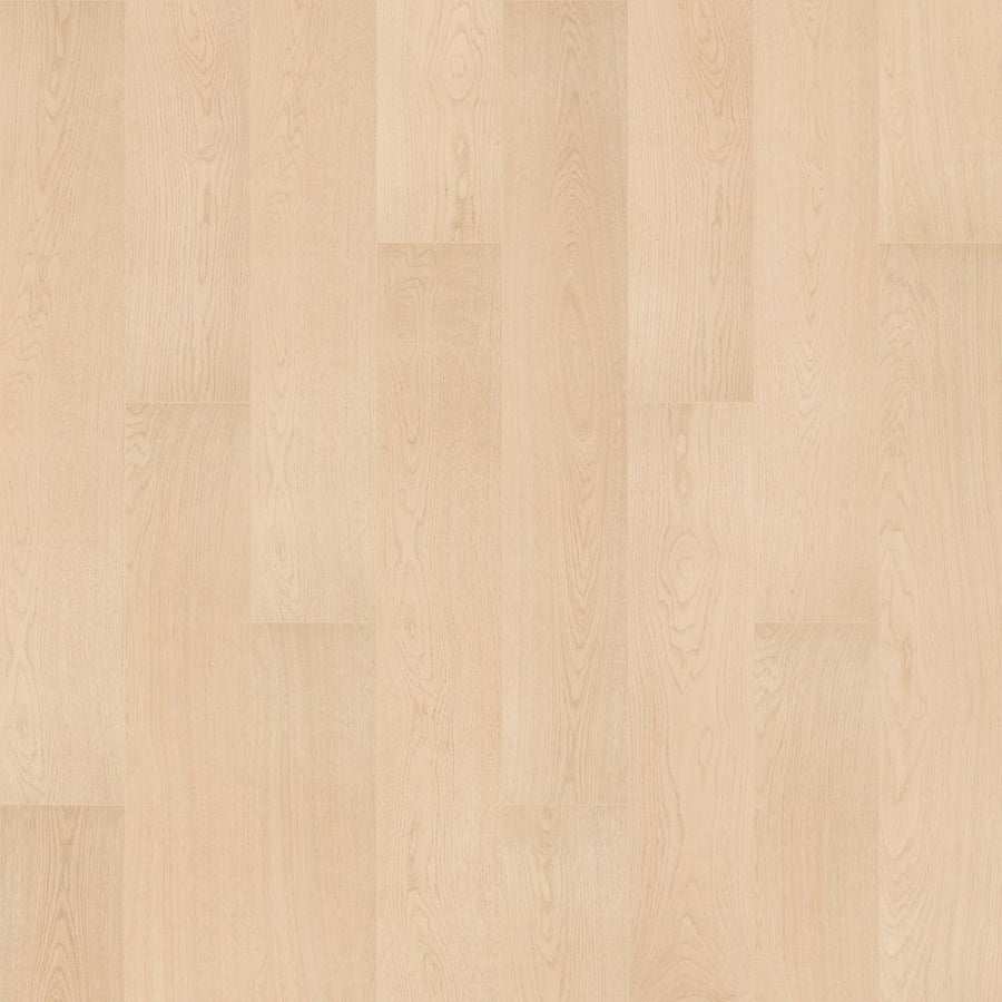 Oxford Manor 7.5" Vinyl Plank features light wood-look vinyl with a smooth, matte finish and natural grain. Installed in a staggered, seamless pattern, it offers modern style and the durability of luxury vinyl flooring.