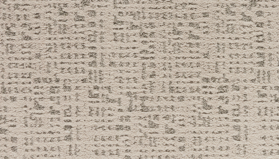 A close-up of Luxuriant Path Pet Friendly Carpet in Gleam, a beige, stain-resistant option featuring an abstract pattern with gray lines and shapes on its textured surface.