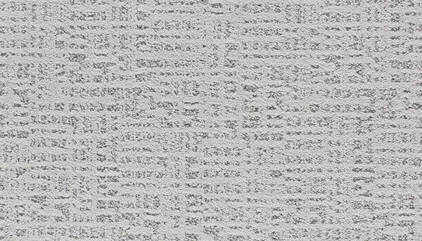 Close-up of Luxuriant Path Pet Friendly Carpet in Flute, a light gray, stain-resistant carpet with a textured surface and subtle irregular grid pattern featuring raised, slightly darker sections.