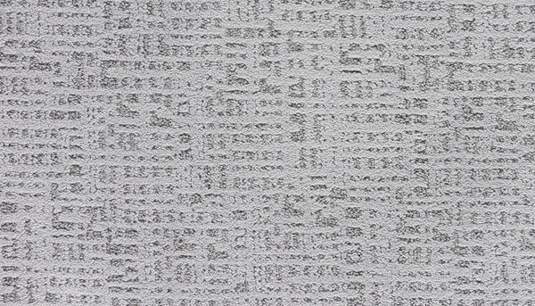 Luxuriant Path Pet Friendly Carpet in Lincoln is a light gray, textured carpet with a subtle, irregular grid and block pattern. Its durable, stain-resistant surface features raised and recessed areas for a modern, soft geometric look.