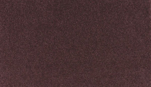 A close-up of the Luxuriant Touch III Pet Friendly Carpet in Sangria shows its soft, textured surface in a rich hue—offering both comfort and style with durable, pet-friendly fabric.