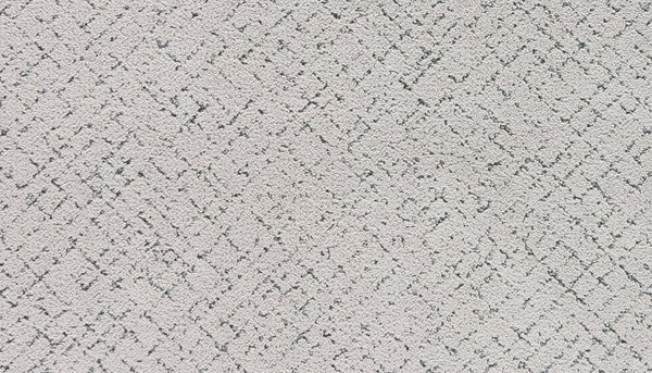 Close-up of Luxuriant Weave Pet Friendly Carpet in Aurora, featuring a subtle diamond and zigzag pattern with darker gray lines. The soft, slightly fuzzy texture is ideal for pets.