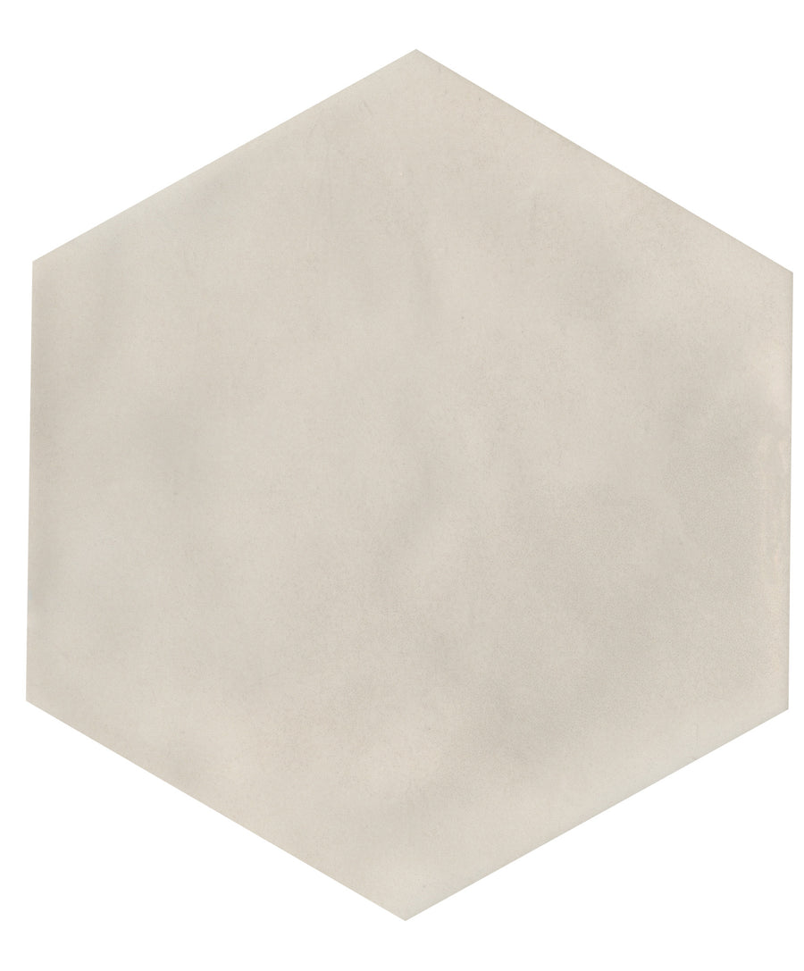 The Maiolica 7x8 Hexagon Ceramic Tile features a large, light beige design with a smooth matte finish and subtle shading, ideal for bringing elegant style to modern interiors.