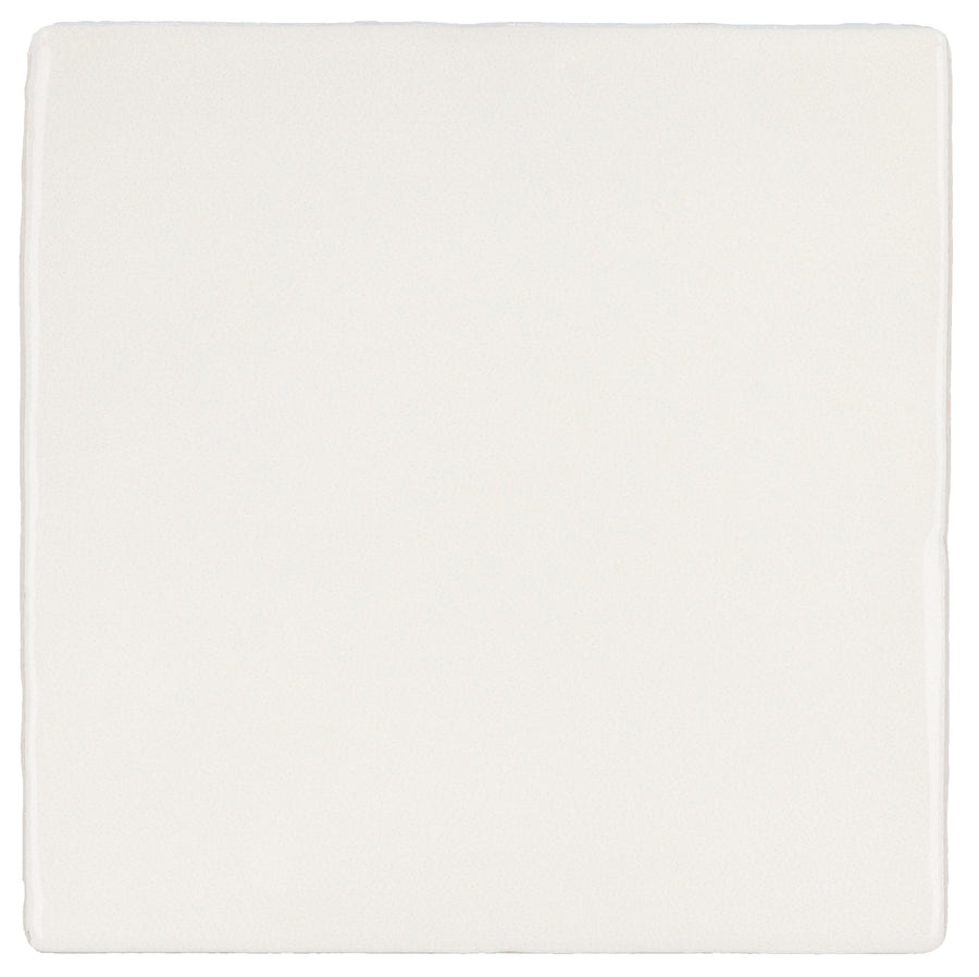 The Manacor 4" x 4" Ceramic Tile in White features smooth edges and a matte finish, offering subtle Spanish elegance to any space.