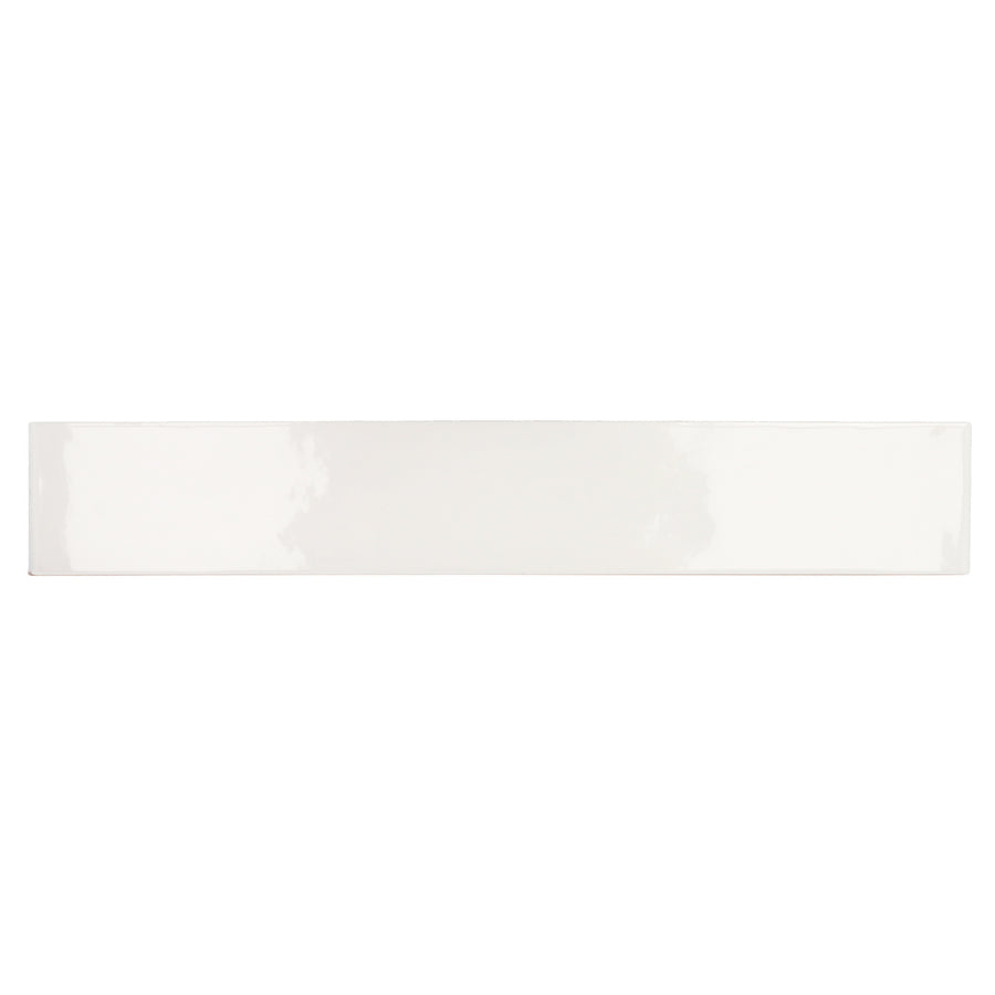 The Manacor 2.5" x 16" Ceramic Tile in white is displayed against a plain white background, emphasizing its contemporary design and sleek glossy finish.