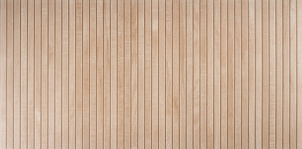 Deja View 24x48 Matte Rectified Porcelain Tile features a light brown, wood-like linear design with evenly spaced vertical grooves and a smooth, subtly grained matte surface that resembles natural wooden panels.