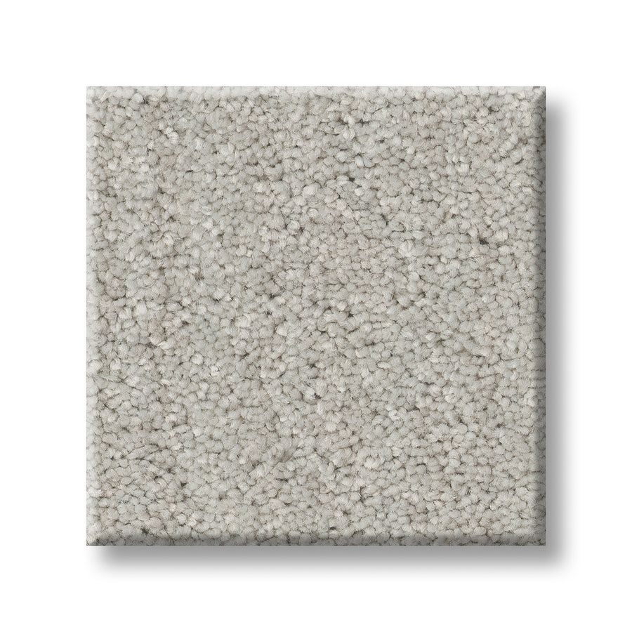 The Serene Stria Family Friendly Carpet features a light gray, textured, tightly woven looped pile. Durable and stylish, it's perfect for busy homes. Shown as a square sample on a white background.