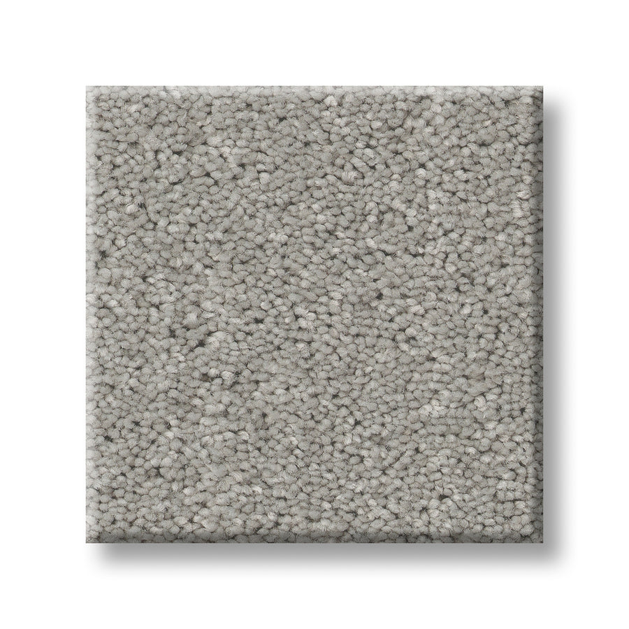 A square sample of Serene Stria Family Friendly Carpet in light gray, featuring a textured, short, dense pile, displayed on a white background.