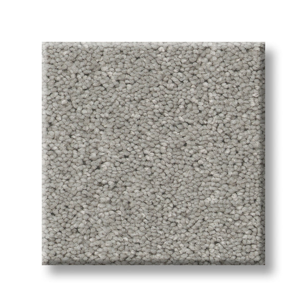 A square sample of Serene Stria Family Friendly Carpet in light gray, featuring a textured, short, dense pile, displayed on a white background.