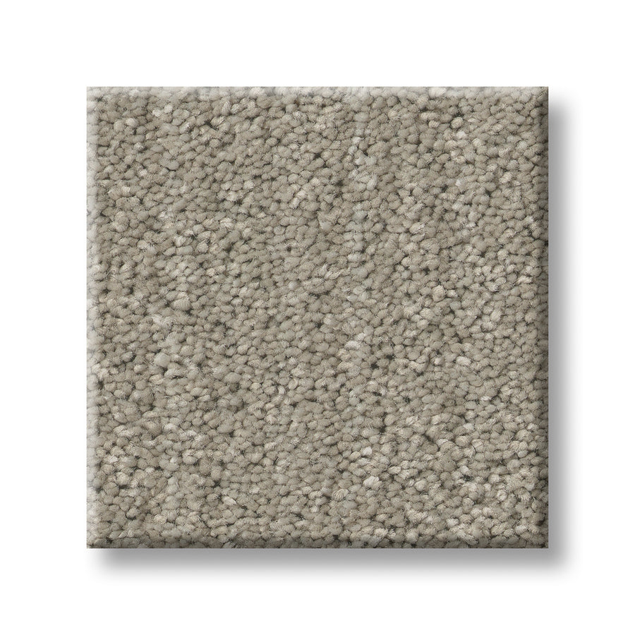 A square sample of Serene Stria Family Friendly Carpet in light gray, featuring a soft, plush texture, is displayed against a white background.