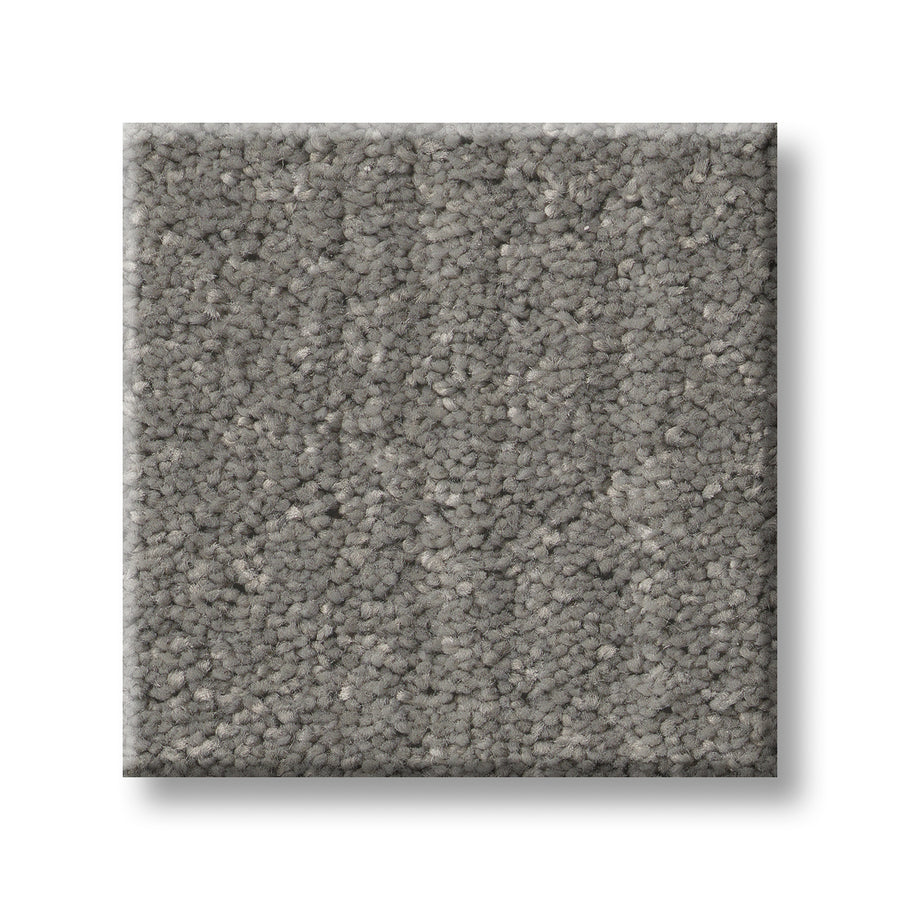 A square sample of Serene Stria Family Friendly Carpet in medium-pile, light gray with a soft, textured surface is shown on a white background.