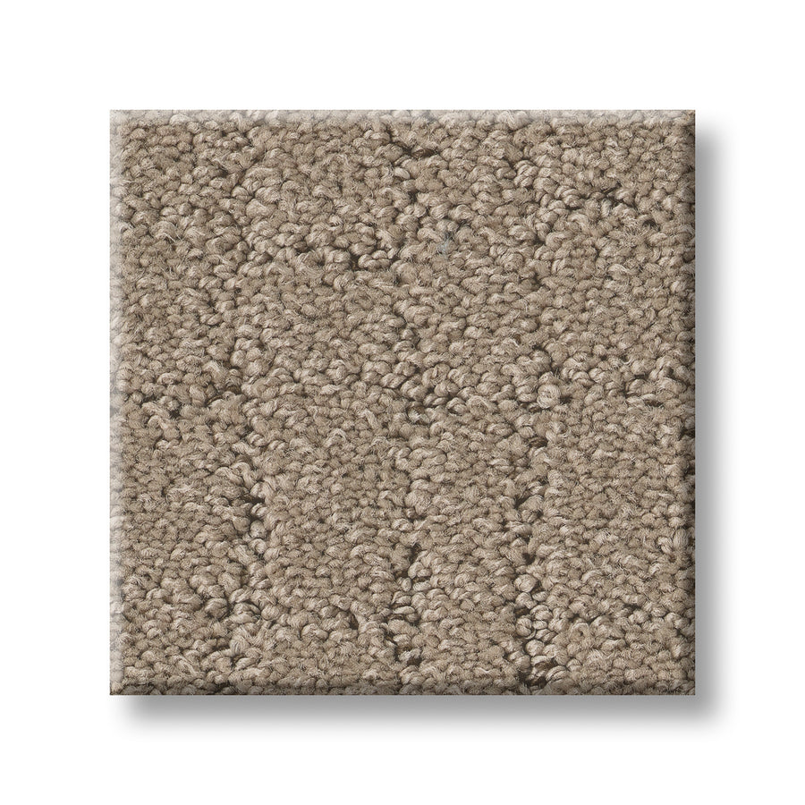 A square swatch of Block Party Family Friendly Carpet, shown in beige-brown with tightly looped, textured fibers, is displayed against a white background.