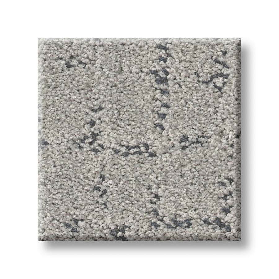 A square sample of Block Party Family Friendly Carpet in light gray with a subtle, dark gray geometric pattern is shown on a white background.