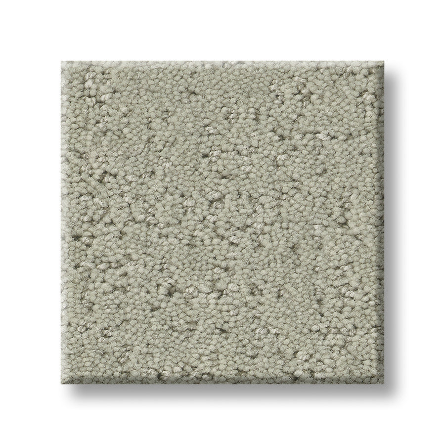 A square sample of Canvas Comfort Blue Family Friendly light gray, textured loop pile premium carpet is displayed on a white background.