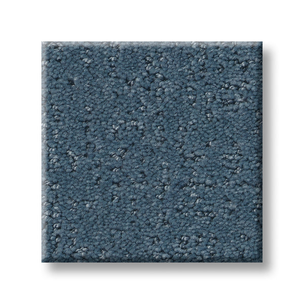 A square swatch of Canvas Comfort Blue Family Friendly carpet with a speckled pattern is displayed against a white background.