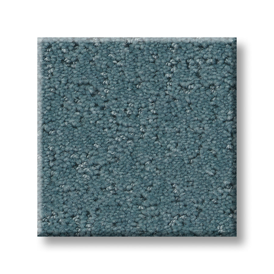 A square sample of Canvas Comfort Blue Family Friendly textured, teal-blue premium carpet with a looped pile surface is shown against a white background.