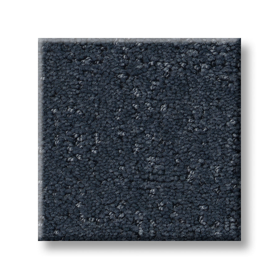 A square sample of Canvas Comfort Blue Family Friendly carpet with dark blue, plush looped pile is shown on a white background—ideal for those seeking a luxurious, stylish, and family-friendly flooring option.