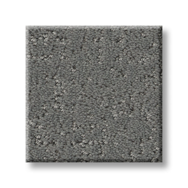A square sample of Canvas Comfort Blue Family Friendly carpet, featuring a gray textured looped pile pattern, is shown on a white background.