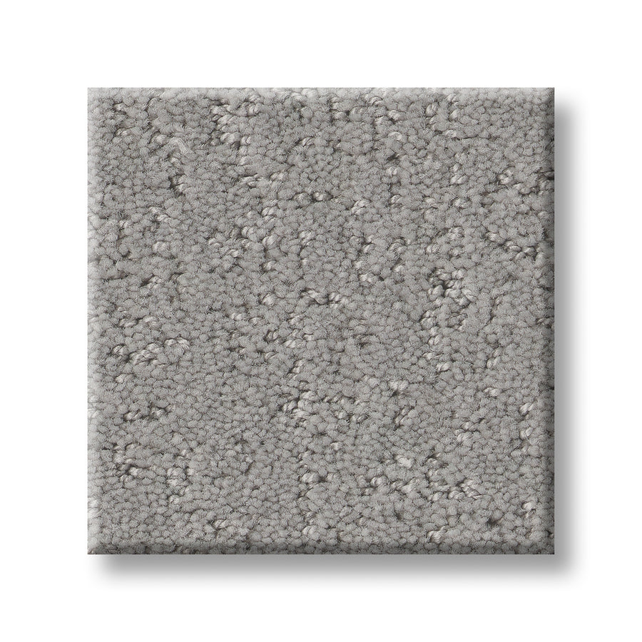 A square swatch of Canvas Comfort Blue Family Friendly carpet in light gray, featuring a soft, looped pile texture, displayed on a white background.