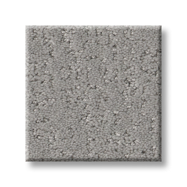 A square swatch of Canvas Comfort Blue Family Friendly carpet in light gray, featuring a soft, looped pile texture, displayed on a white background.