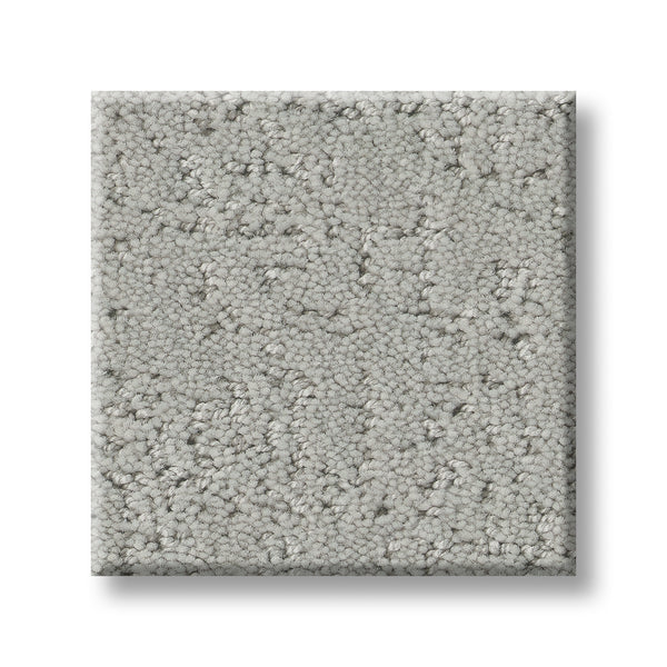 A square sample of Canvas Comfort Blue Family Friendly, a light gray loop-pile carpet with a textured surface, is shown on a white background.