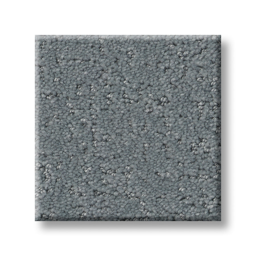 A square swatch of Canvas Comfort Blue Family Friendly carpet, featuring a premium, medium gray tone with a textured, slightly mottled look, displayed on a white background.