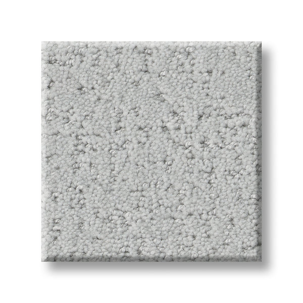 A square sample of Canvas Comfort Blue Family Friendly carpet in light gray with a soft, looped textured surface is shown on a white background.