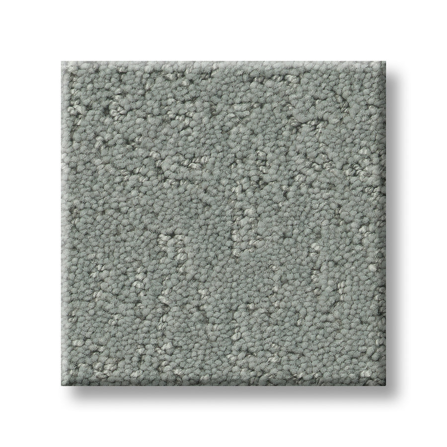 A square sample of Canvas Comfort Blue Family Friendly carpet, featuring a soft, looped pile pattern in light gray, displayed on a white background.