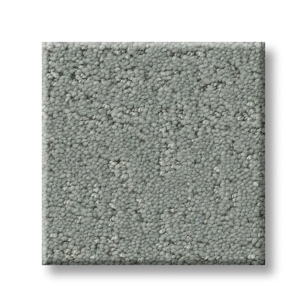 A square sample of Canvas Comfort Blue Family Friendly carpet, featuring a soft, looped pile pattern in light gray, displayed on a white background.
