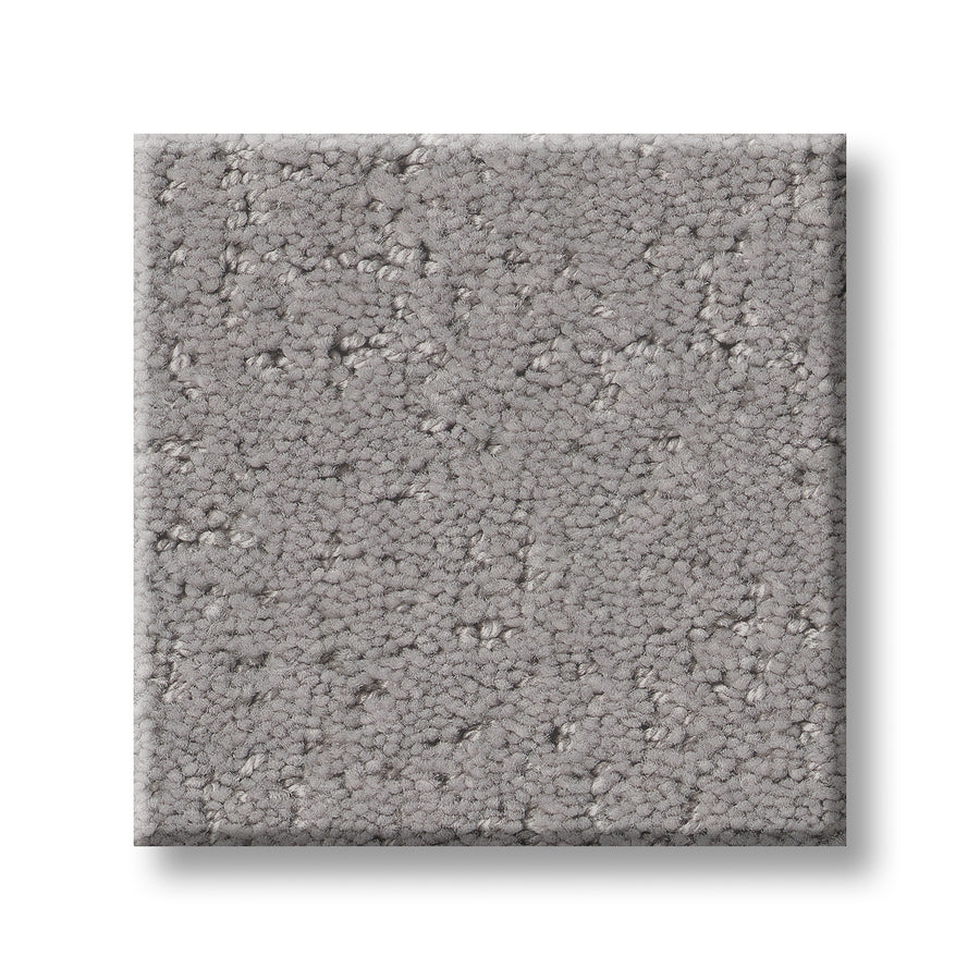 A sample square of Canvas Comfort Blue Family Friendly carpet, featuring a light gray color, premium soft and dense texture, and a uniform, lightly speckled pattern shown on a white background.