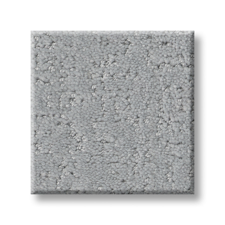 A sample of Canvas Comfort Blue Family Friendly, a luxurious light gray carpet with a subtle, irregular texture, is displayed on a white background.