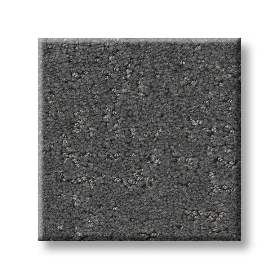 A square sample of Canvas Comfort Blue Family Friendly carpet, featuring a luxurious dark gray textured, subtly uneven looped pile pattern, shown on a white background.