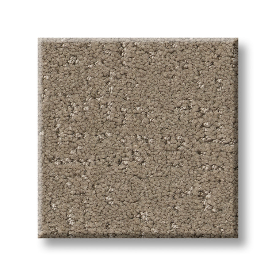 A square swatch of Canvas Comfort Blue Family Friendly carpet, featuring light brown color and a looped pile texture, is displayed on a white background to showcase its premium, family-friendly appeal.