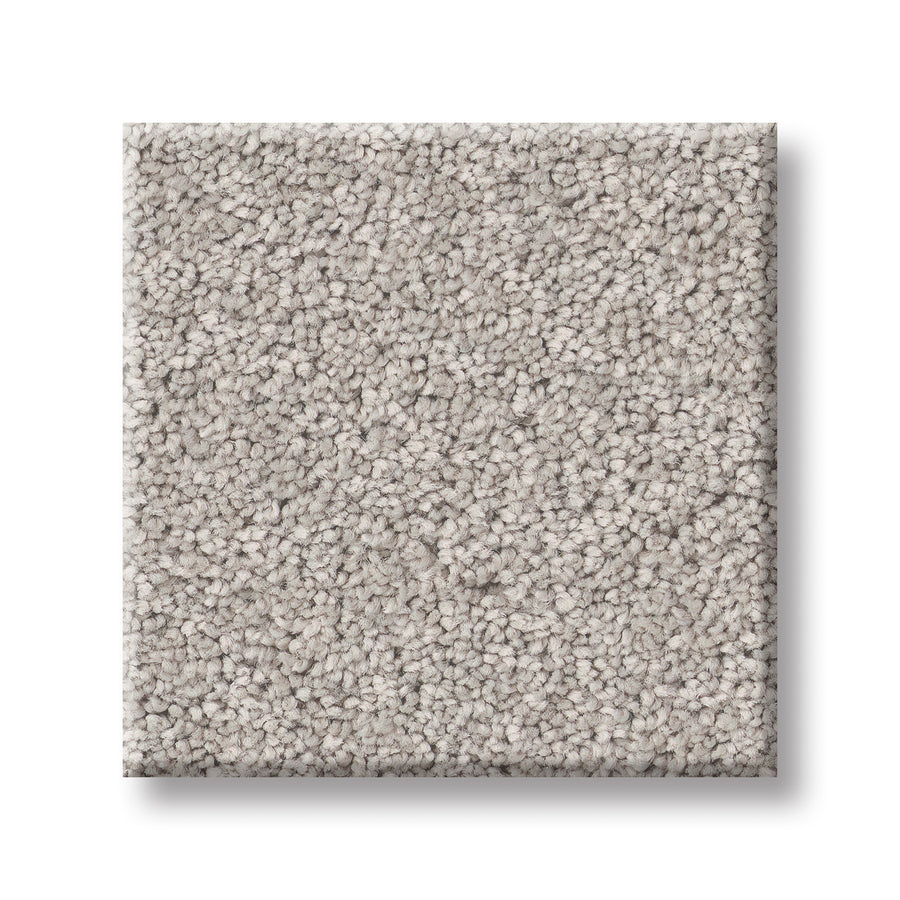 A square sample of light gray, loop-pile Velvet Touch I Pet Friendly Carpet with a soft, speckled texture is displayed on a white background—an inviting, pet-friendly flooring option for any home.