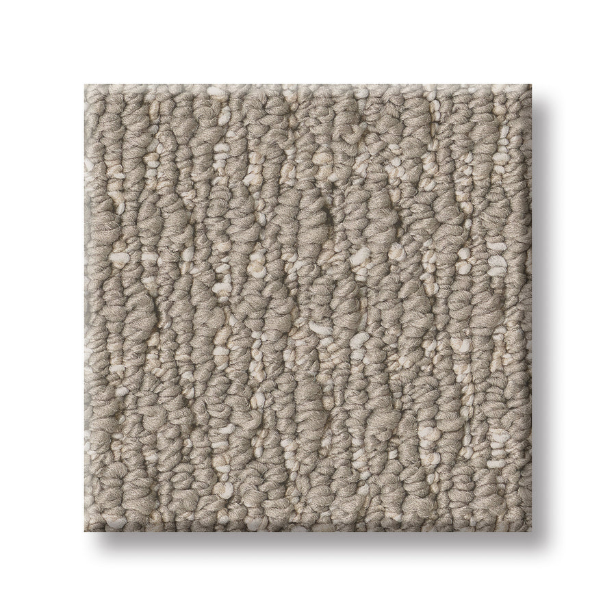 A square sample of Cozy Embrace Pet Friendly Carpet, featuring light taupe textured loop-pile with tightly woven, raised loops for luxurious comfort. Displayed on a plain white background.