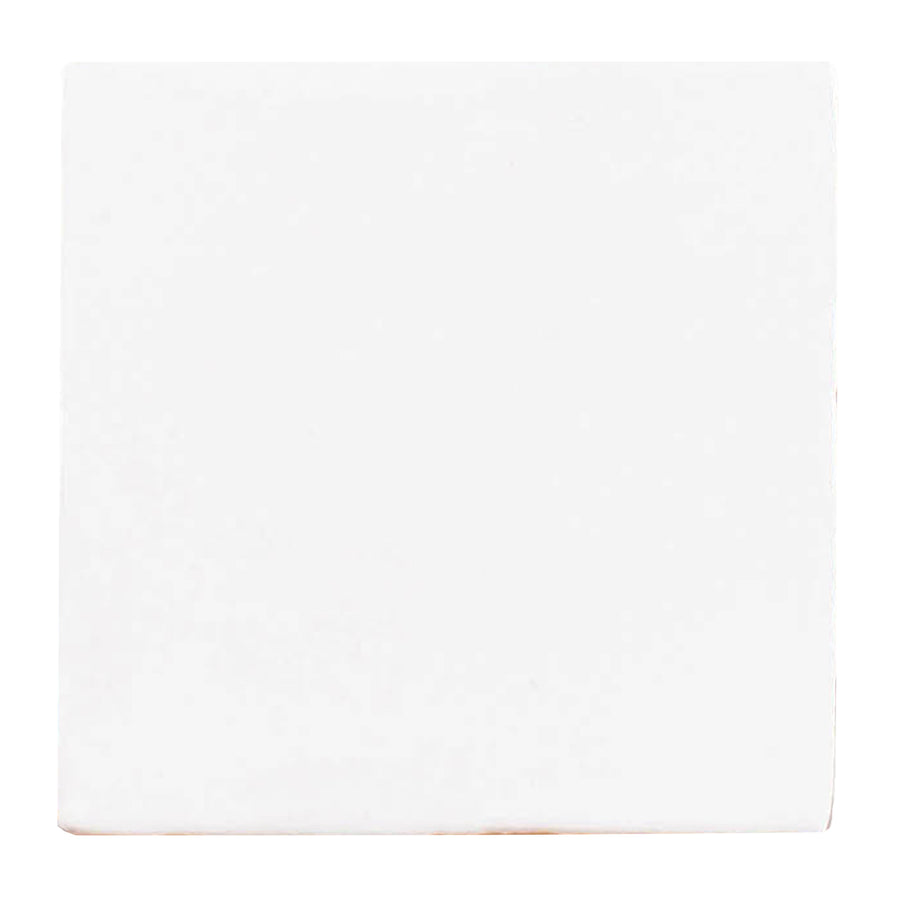 A single Martha's Manor 4" x 4" Square Ceramic Tile in Cottontail, isolated on a white background—an elegant accent for sophisticated place settings and refined interiors.