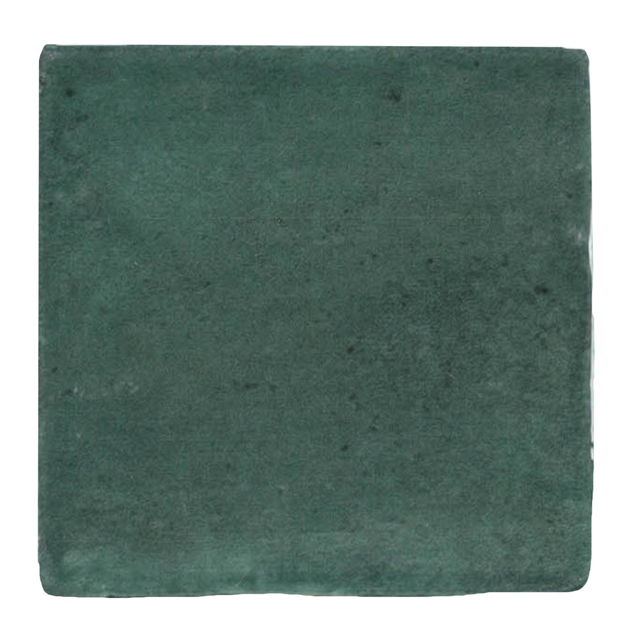 The Martha's Manor 4" x 4" Square Ceramic Tile in Myrtle Grove features a slightly uneven surface, subtle color variations, and imperfect edges for a handcrafted look—perfect for adding rustic charm to unique interior accents.
