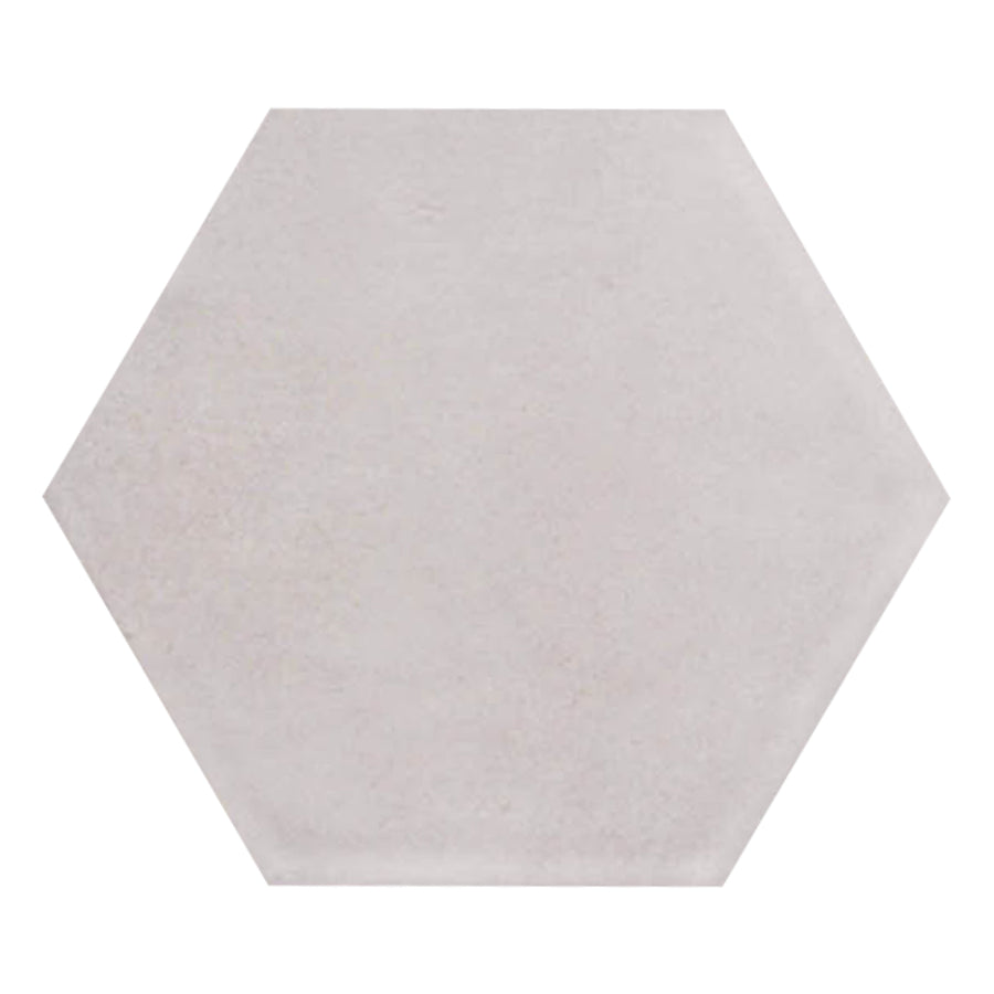 Martha's Manor 4" x 5" Hexagon Ceramic Tile in Subtle Slate features a plain, light gray geometric hexagon shape with a smooth surface, displayed against a white background.