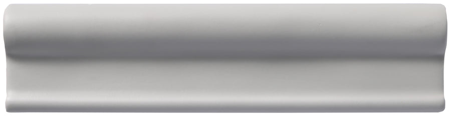 The Zephyr 2x8 Rail Molding Ceramic Tile is a rectangular, light gray Mediterranean tile with a rounded bullnose edge, showcasing handcrafted luxury against a white background.