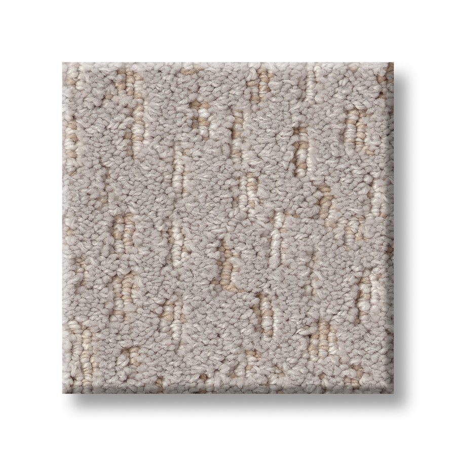A square sample of Ambitious On Trend Carpet in textured beige with a subtle, raised dotted pattern is displayed on a white background.