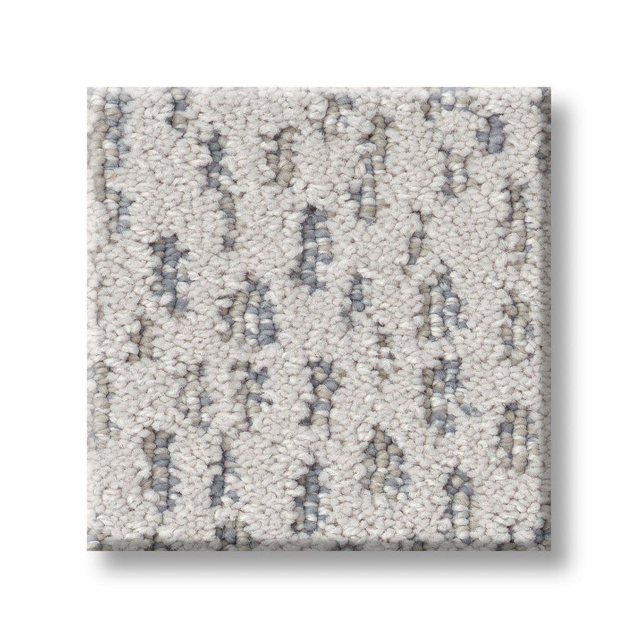 A square sample of Ambitious On Trend Carpet, featuring a light beige color with scattered gray and taupe speckles, displayed on a white background.