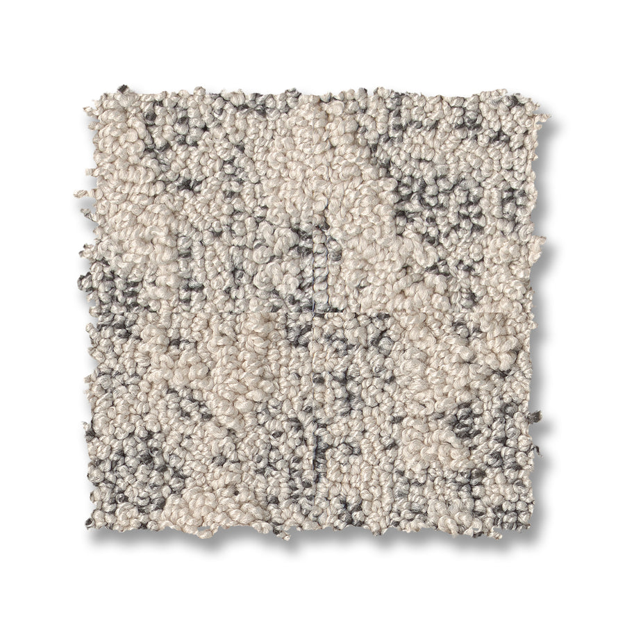 Illumination On Trend Carpet: a square swatch of premium textured loop, showcasing light beige and gray tones in a mottled, speckled pattern—ideal for luxurious flooring.