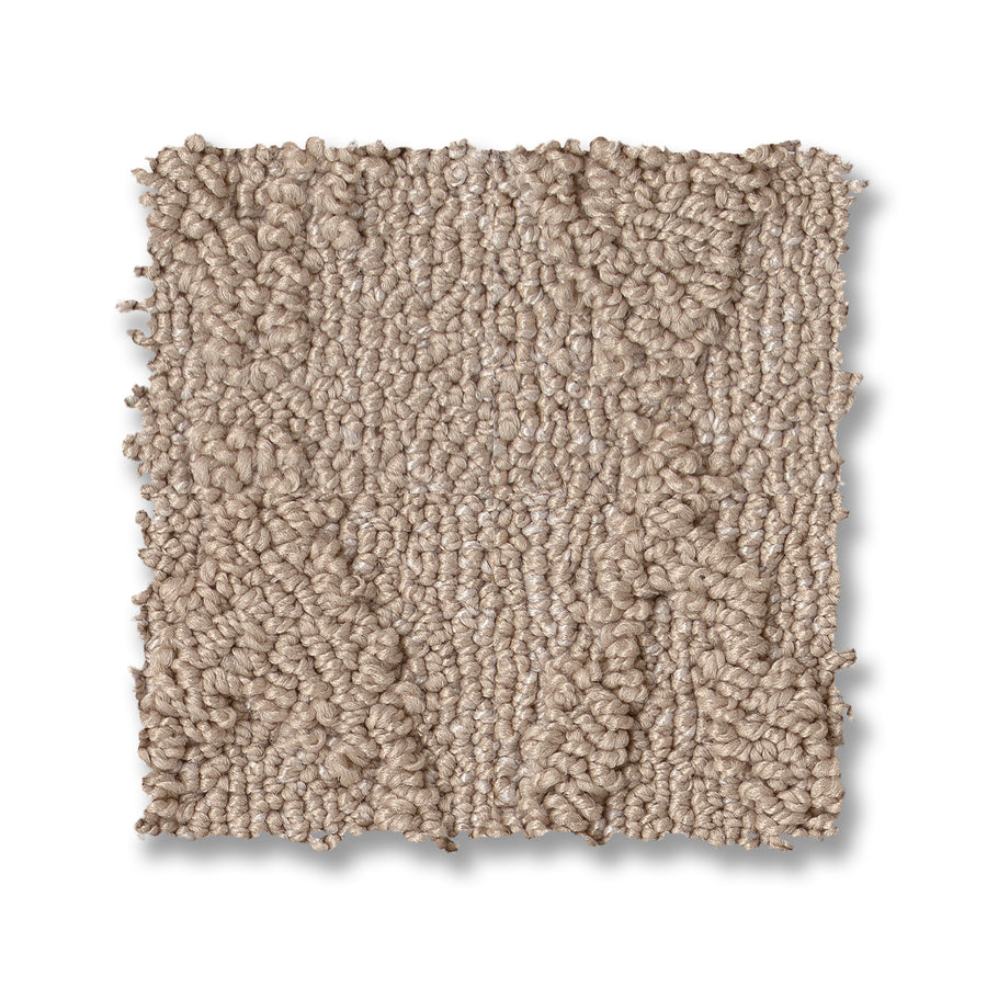 A square sample of Illumination On Trend Carpet in light beige with a textured loop pile and subtle pattern, displayed on a white background.