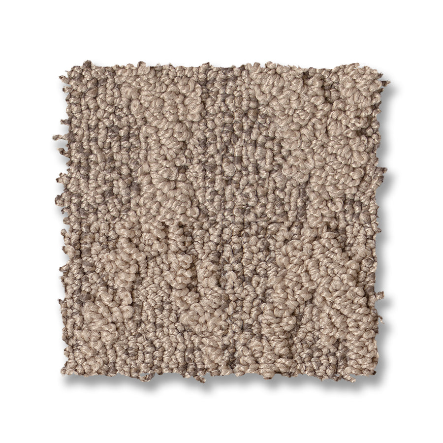 A square swatch of Illumination On Trend Carpet in beige, featuring a textured loop and subtle striped pattern, shown on a white background.