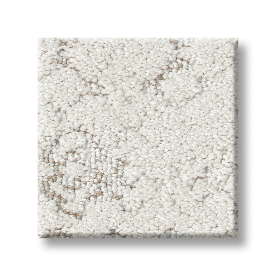A square sample of Evoke On Trend Carpet is shown on a white background, featuring a plush, looped pile surface in off-white with subtle light gray accents.