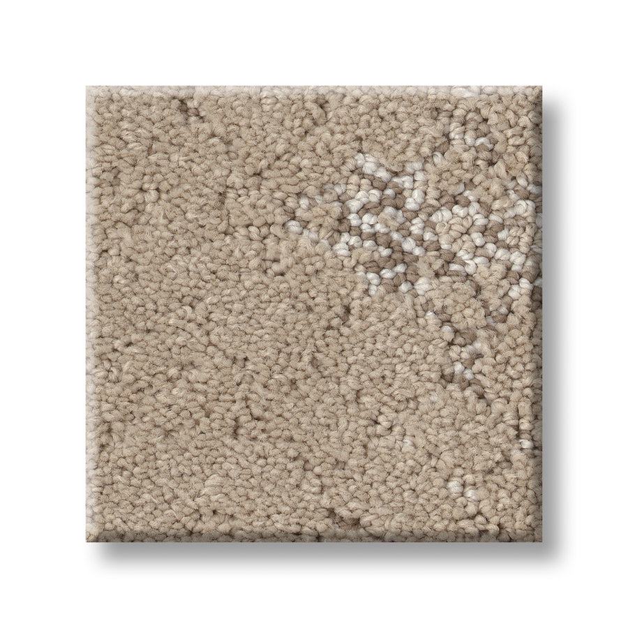 A square sample of Evoke On Trend Carpet in beige, showcasing a textured looped pile and subtle abstract pattern, is displayed on a white background with a faint shadow beneath.