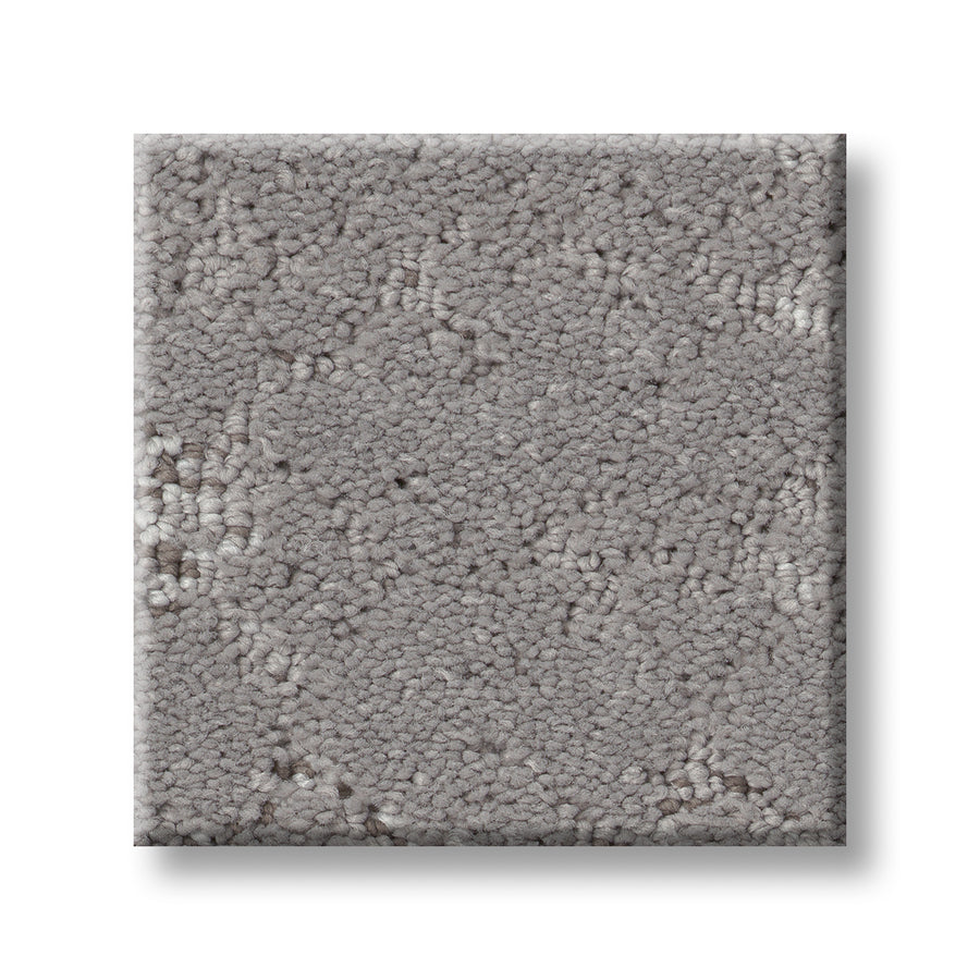 A square sample of Evoke On Trend Carpet in light gray, with a soft loop and cut pile texture, is shown on a white background.