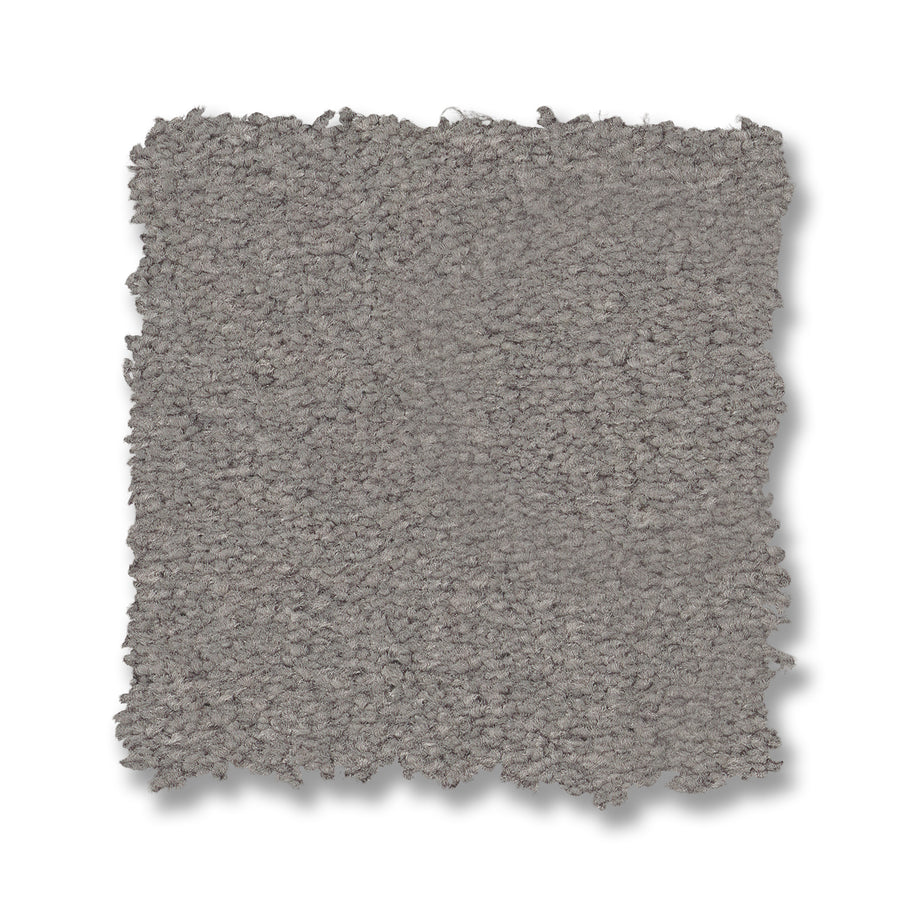 Finery Pet Friendly Carpet is a square, light gray swatch with a plush, textured surface and slightly uneven edges, displayed on a white background.
